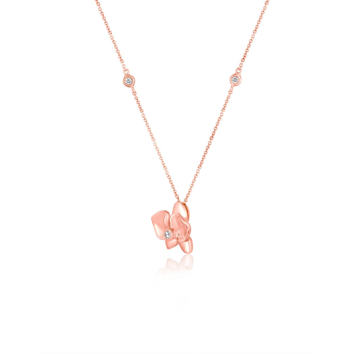 Beautiful Flower Pendant Necklace.
The Chain & Pendant are 18K Rose Gold.
There are 0.06 Carats in Diamonds G SI.
The flower measures 0.50