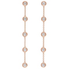 Pendants d'oreilles en or rose et diamants