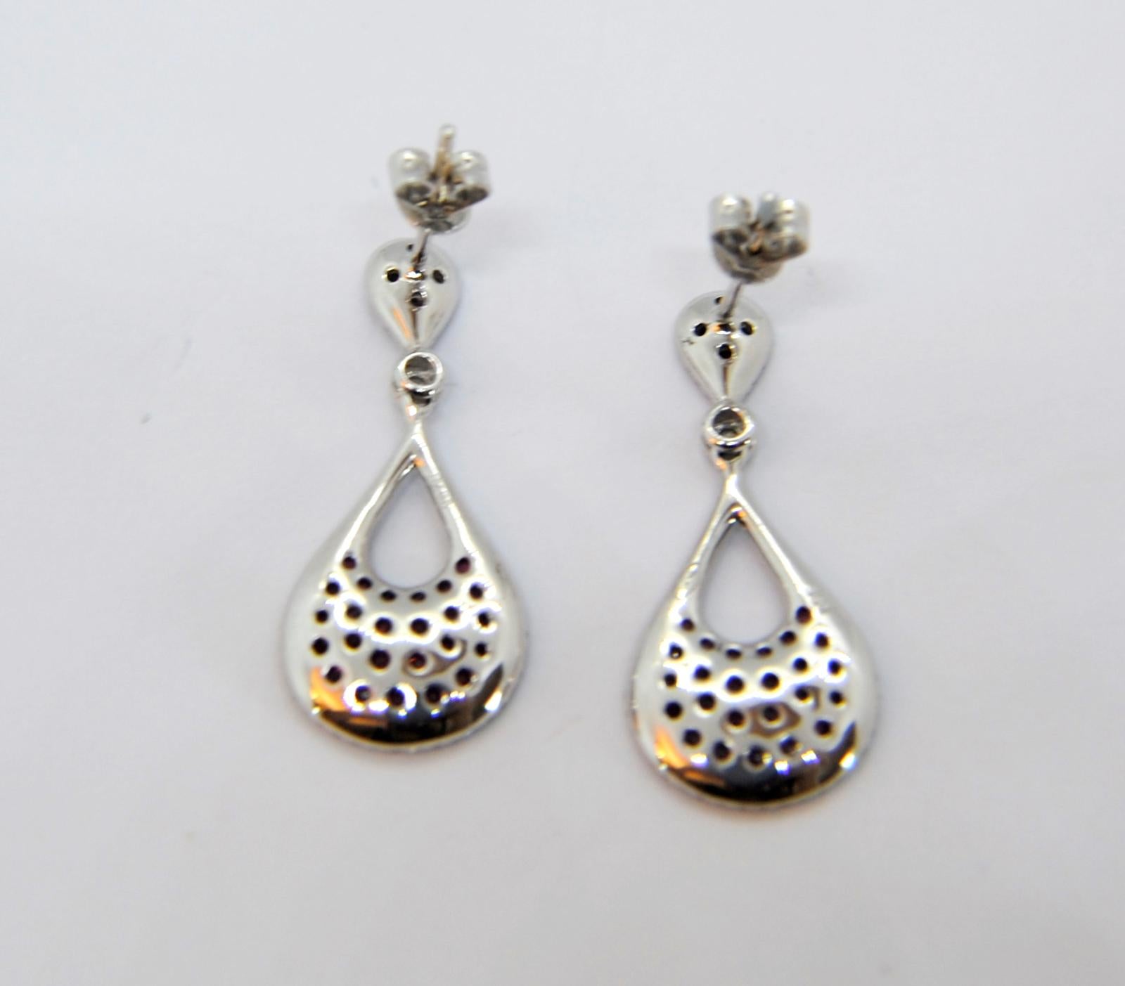 Contemporary Diamond and Rubi Dangle Earrings in 18 Karat White Gold