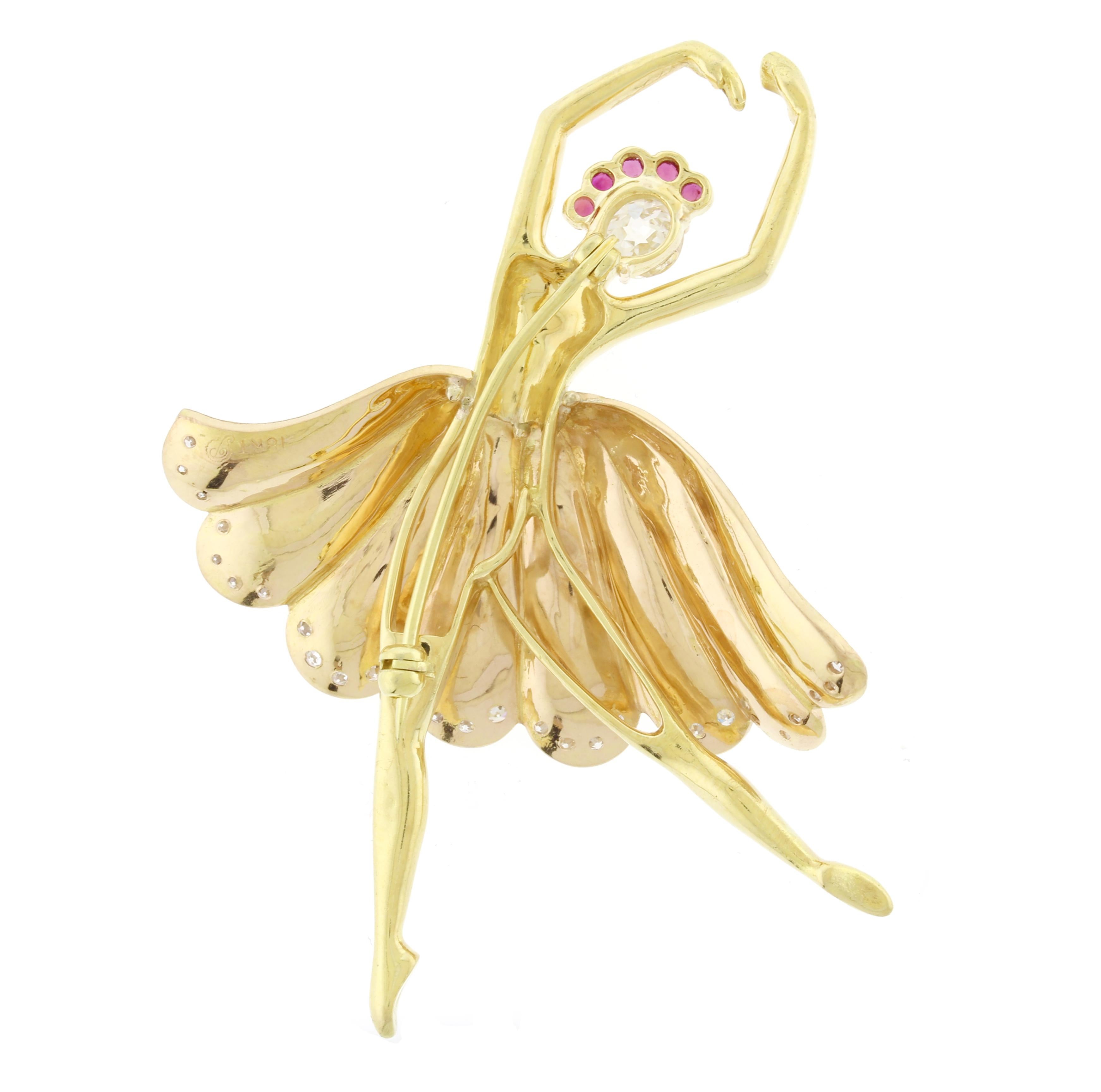This elegant brooch was designed and made at Pampillonia Jewelers. The skirt is done in a matte finished rose gold with the bottom outlined in diamonds.
• Metal: 18kt  Rose Gold and Yellow Gold
• Designer: Pampillonia Jewelers
• Circa: 2023
•