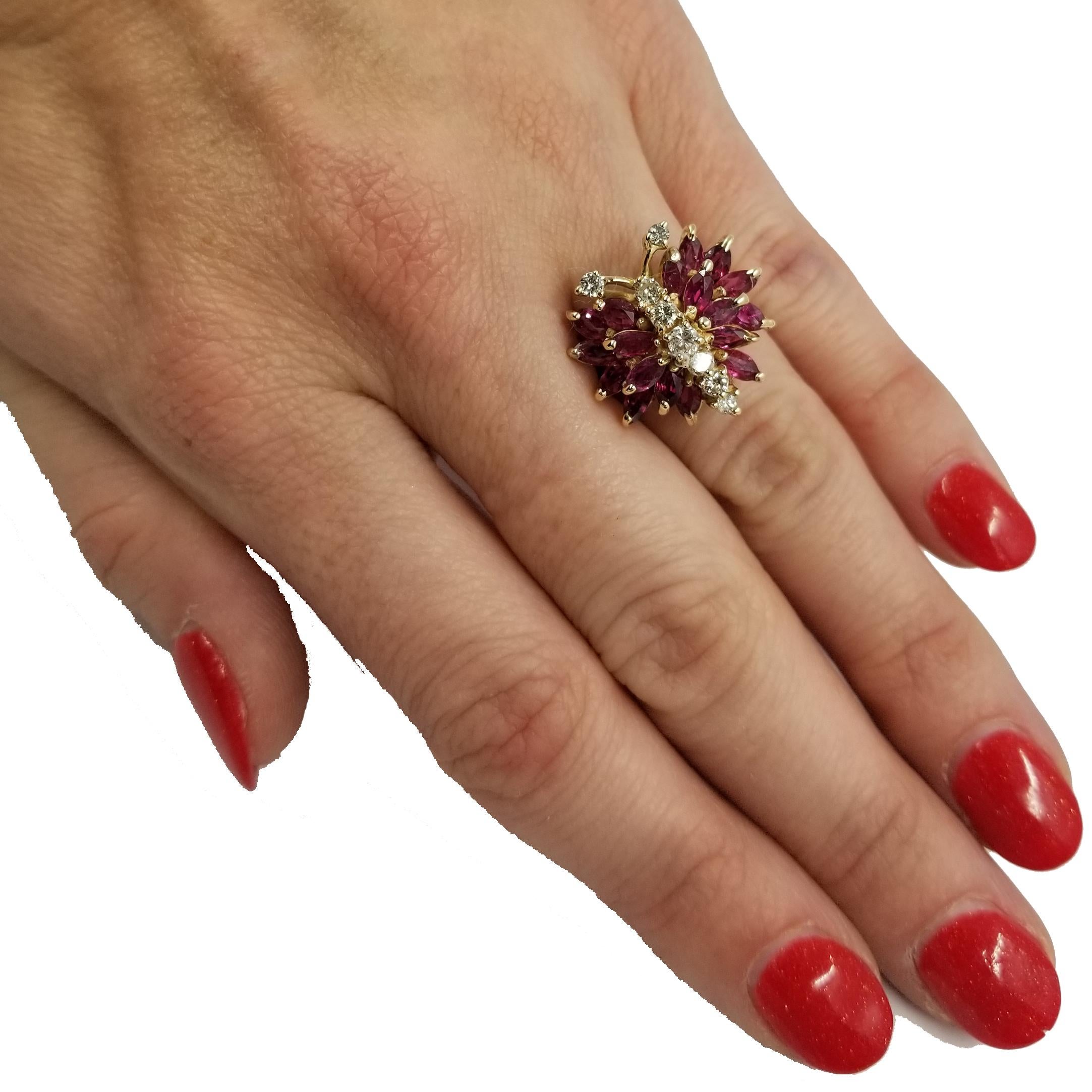 14 Karat Yellow Gold Ring Featuring 18 Marquise Shaped Rubies Totaling Approximately 1 Carat, And 8 Round Diamonds Totaling Approximately 0.30 Carats of SI Clarity & J Color. Current Finger Size is 5.25; Purchase Includes One Sizing Up or Down 2