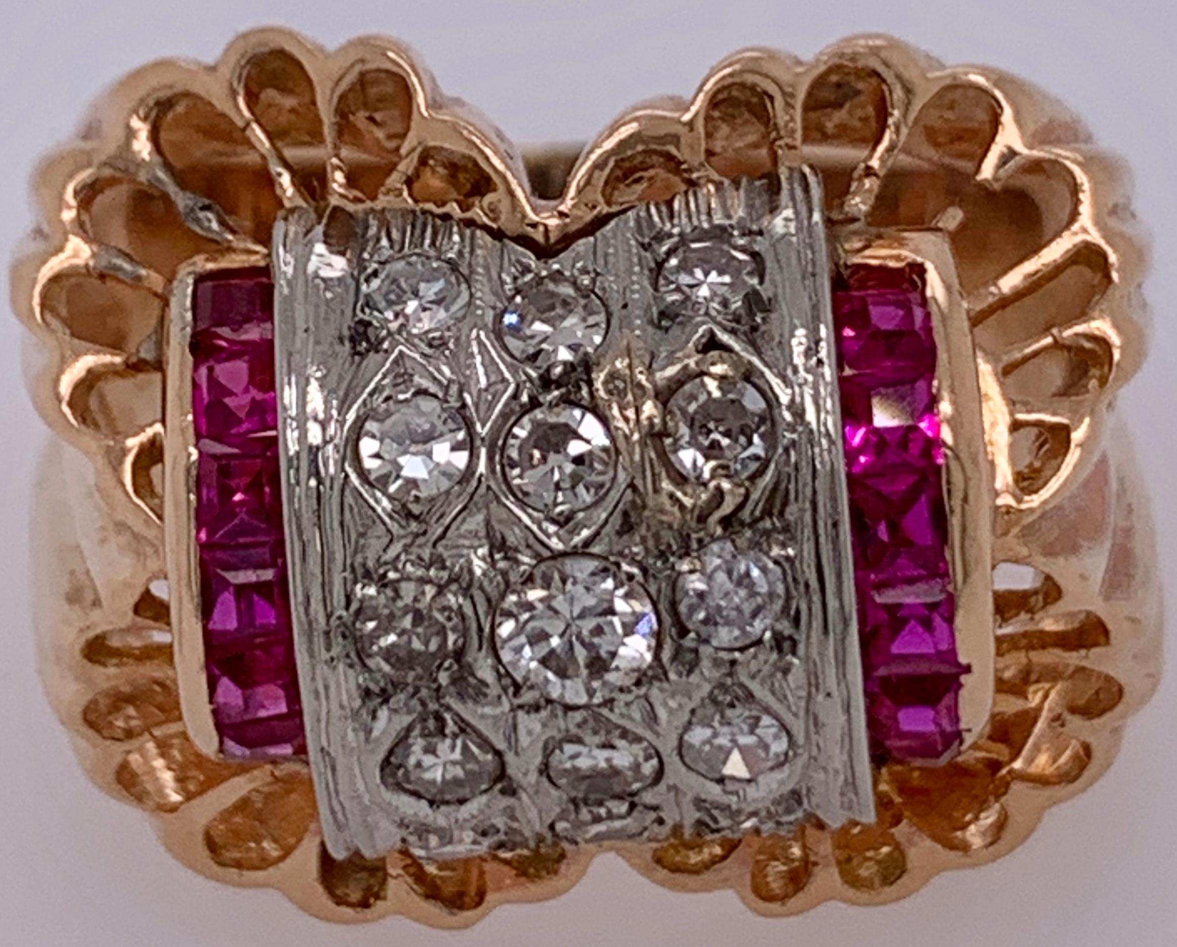 Diamond and Ruby Cluster Ring. This custom yellow gold ring has three center rows of five diamonds with an approx diamond weight of .75ct flanked by six by six ruby baguettes. The whole weighing 15 grams. The modern design ring is certain to