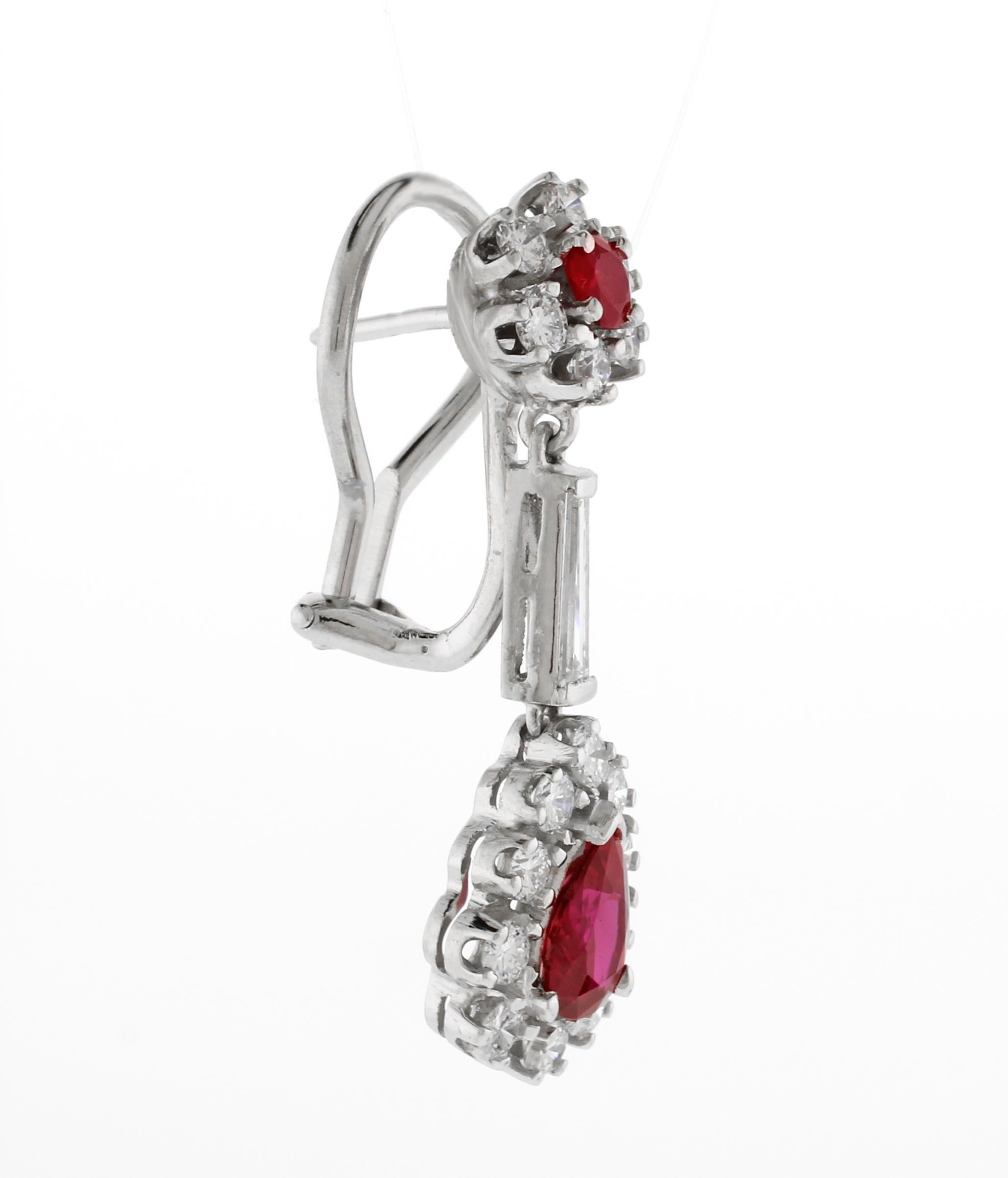 Whether you're looking for a timeless and classic design or a more contemporary and unique style, these ruby and diamond drop earrings are versatile enough to suit many occasions.
♦ Circa: 1960s
♦ Metal: Platinum
♦ Length: 1.25inches
♦ Gemstone: 2