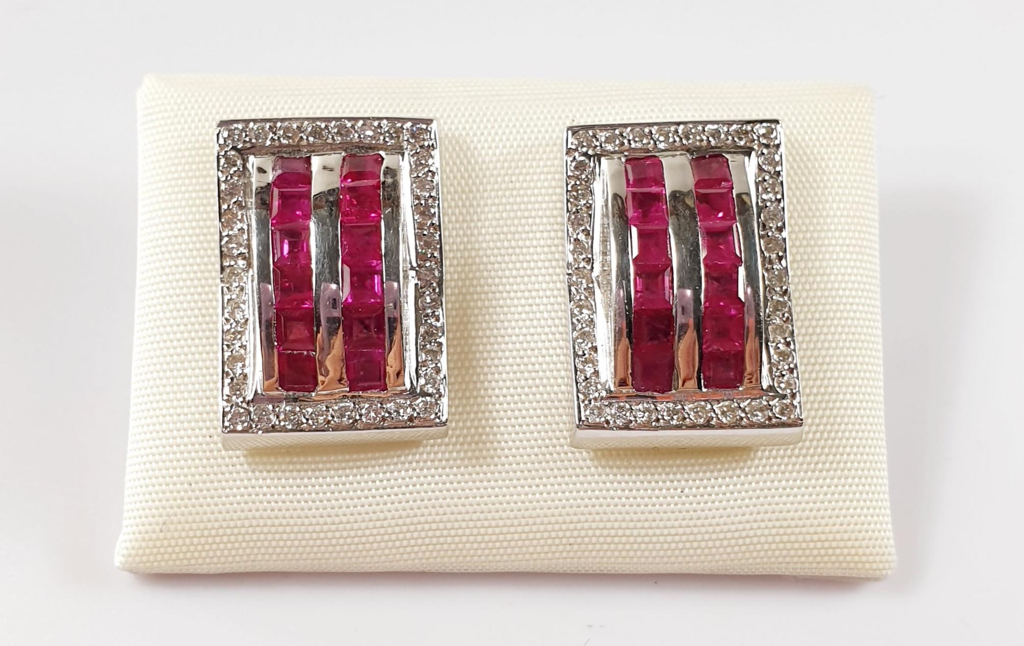 Diamond and Ruby  Earrings in 18 Karat White Gold 
These pair of 18k white gold hoops earrings weight 6,5 grams each and have 0,76ct of diamonds 
Please note that carat weights may slightly vary as each Irama Pradera Jewels creation is handmade. 