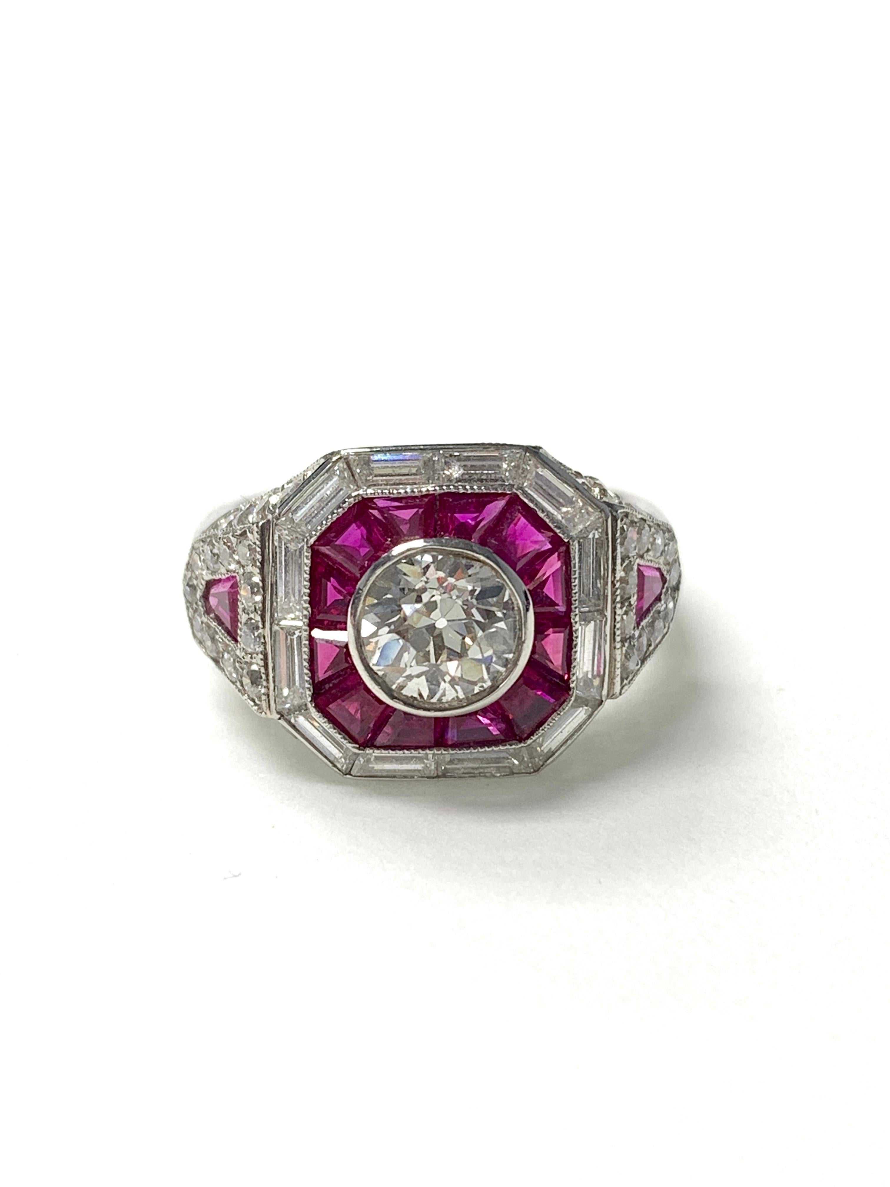 Gorgeous White European Cut  Diamond And Ruby Ring hand crafted in platinum. 
Diamond weight : 0.85 carat ( center ) ( GH color and SI clarity ) 
Diamond weight ( melees ) : 0.87 carat 
Ruby weight : 2 carat 
Metal : Platinum 
Measurements : ring