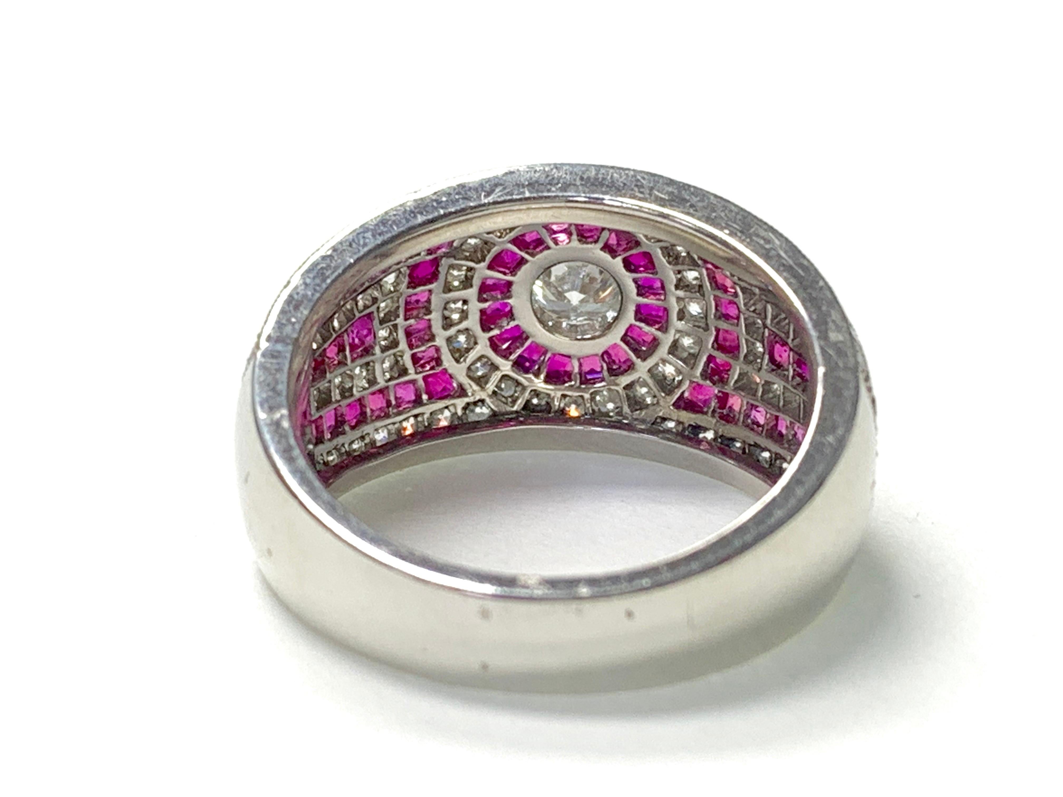 Gorgeous Ruby and diamond engagement ring handcrafted in platinum. 
The details are as follows : 
Diamond weight : 1.40 carat ( GH color and SI clarity ) 
Ruby weight : 1.80 carat 
Metal : Platinum 
Measurements : width : 12.6mm 

