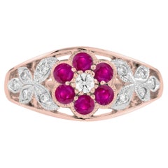 Blumenfrmiger Verlobungsring mit Diamanten und Rubinen aus 14 Karat Rosgold
