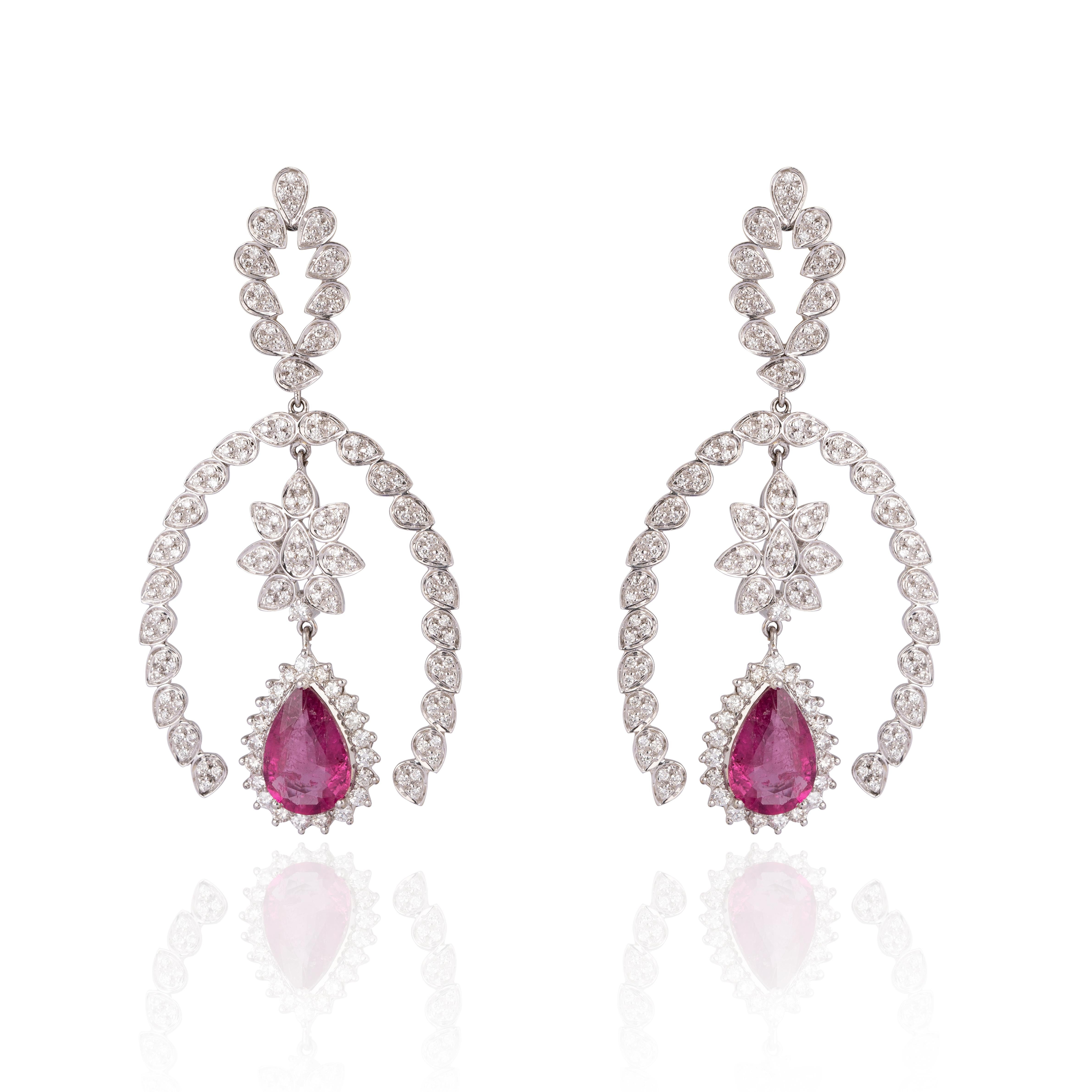 (Diamond 3.71 cts) and (ruby 9.12 cts) (gold earring 18k nw 30.024gm)