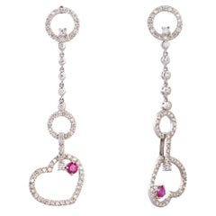 Boucles d'oreilles en or 18 carats avec 1,52 carat de diamants et 0,38 carat de rubis