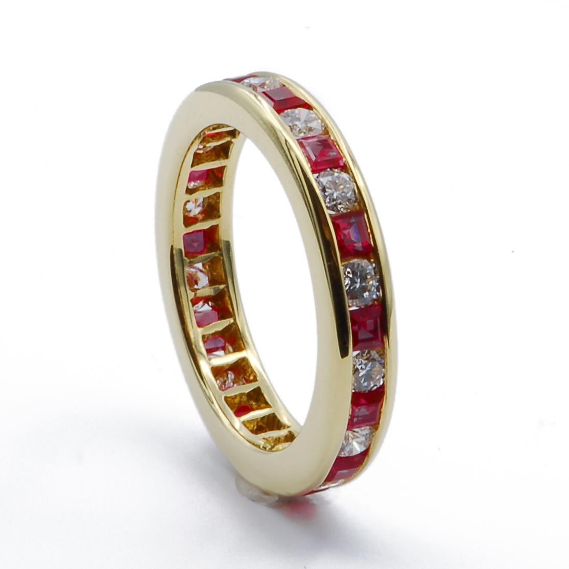 This simply graceful 18k yellow gold eternity band ring contains alternating round diamonds and square cut rubies that are extremely vibrant in color.  The stones are meticulously channel set with a seamless finish. 

0.71 Carats Diamonds
1.3 Carats