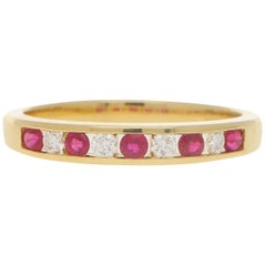 Diamond and Ruby Half Eternity Ring in 18 Karat Yellow Gold