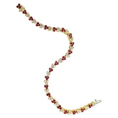 Diamond and Ruby Heart Motif Gold Contemporary Bracelet