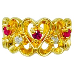 Bague d'éternité en forme de cœur en or 14 carats avec diamants et rubis