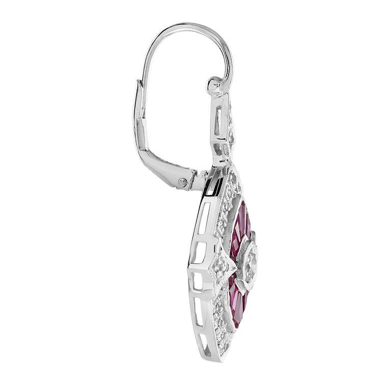 She will adore the Art Deco style brilliant sparkle of these romantic diamond and natural ruby  drop earrings. Crated in 18k white gold with millgrain setting, each light-catching dangle features a marquise-shape composite of round diamonds and