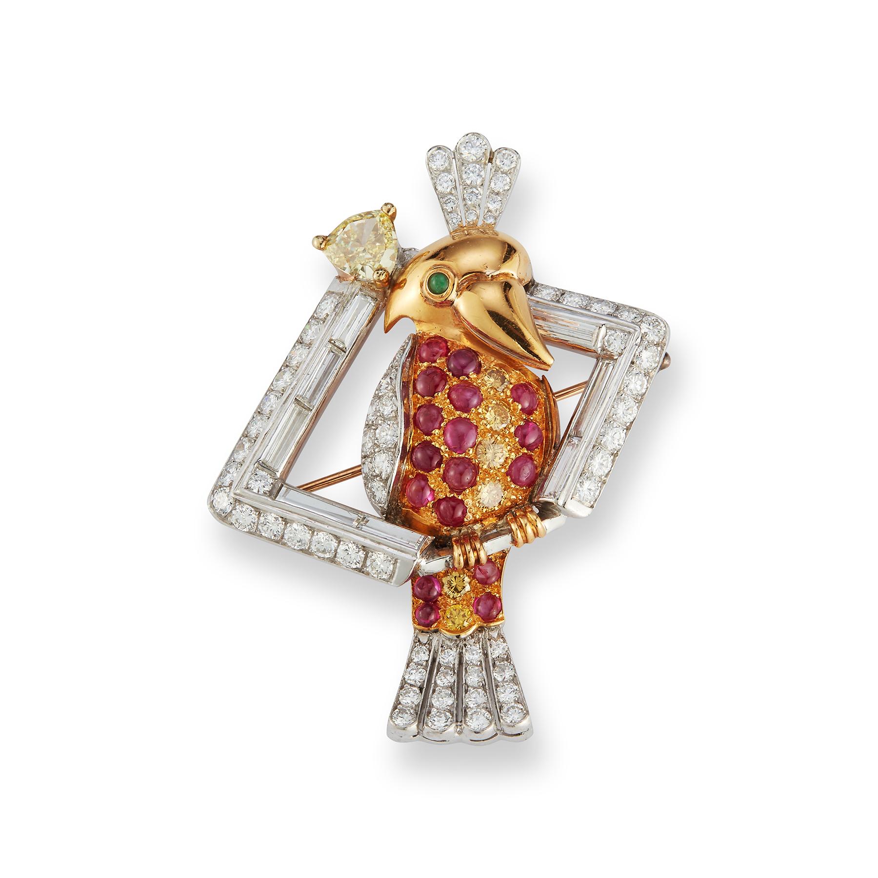 Diamond and Ruby Parrot Brooch with Emerald Eye with App 2.28 ct of Rubies, App. 03 ct Emerald, App 4.44 ct of Diamond set in 18k Yellow Gold and Platinum 
pear shape diamond with yellow tint is .77 ct