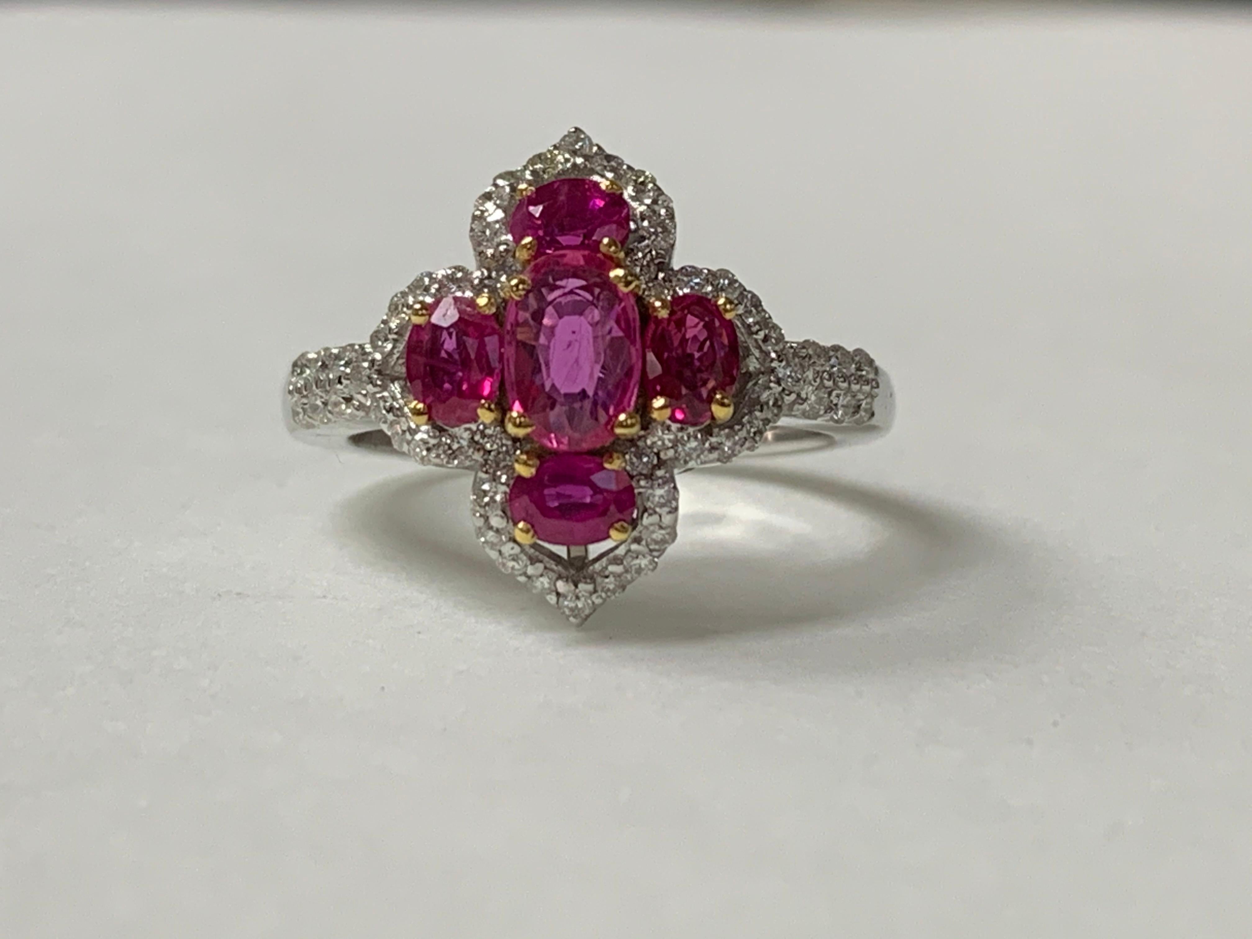 Oval Cut Diamond and Ruby Ring in 18 Karat White Gold
