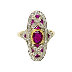 Anello con diamanti e rubini in oro bianco 18 carati