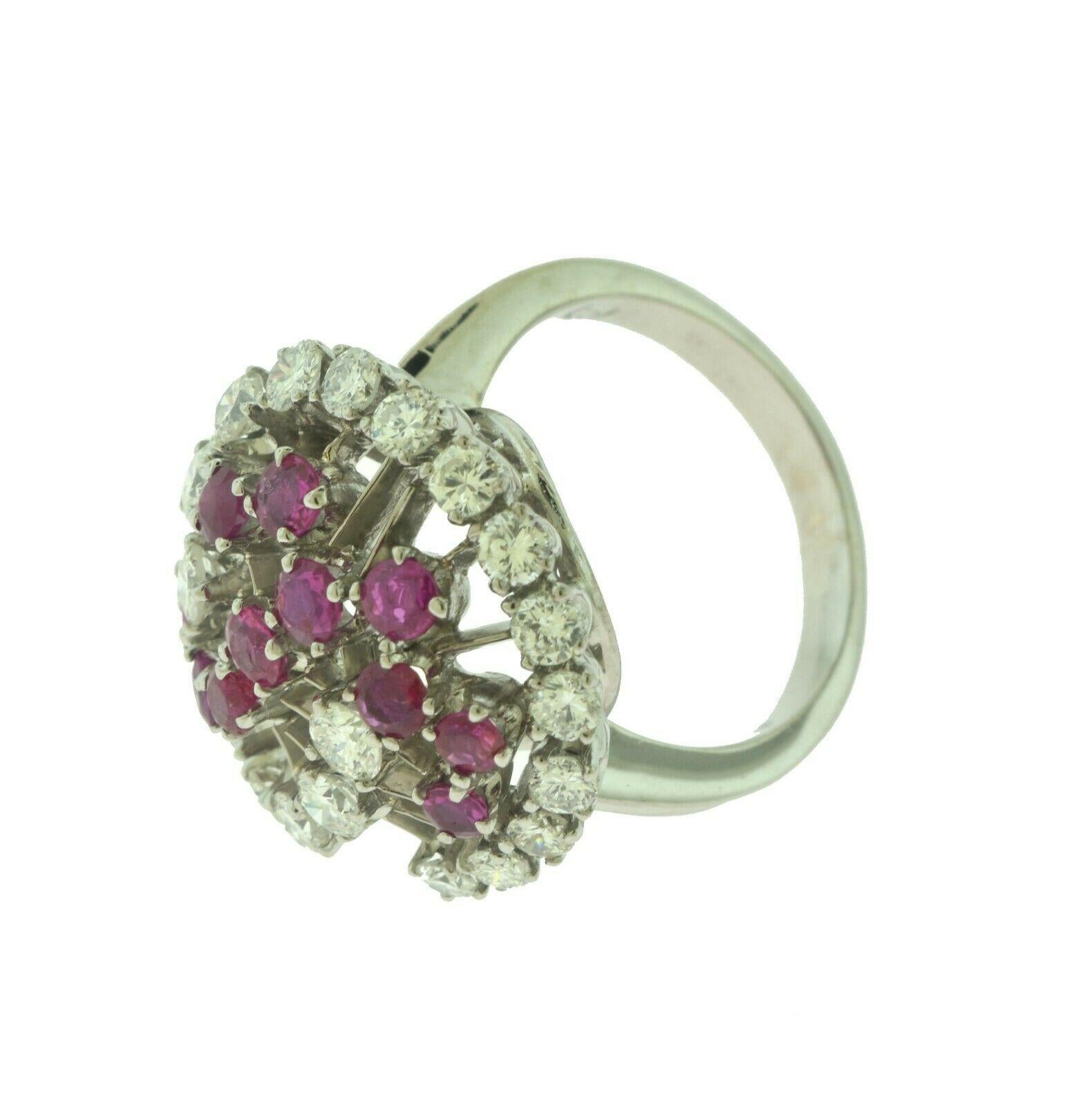 Diamond and Ruby Swirl Motif Cocktail Ring In Good Condition For Sale In Miami, FL