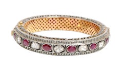 Diamant- und Rubin-Tennisarmreif im Art-Deco-Stil