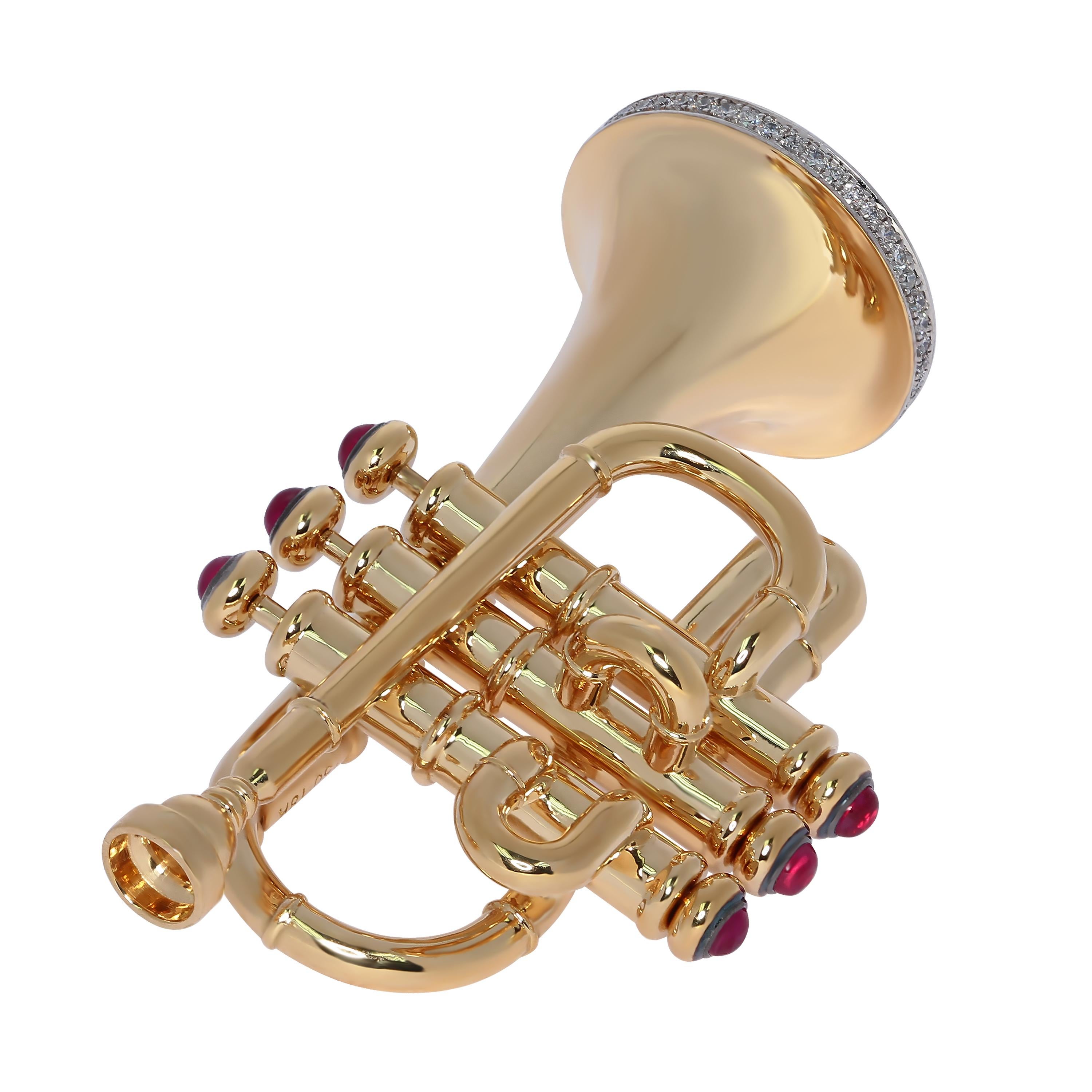 Diamond Ruby 18 Karat Yellow Gold Trumpet Brooch

This sophisticated 18 Karat Yellow Gold Brooch from our Artistic Collection brims with luxurious character and charm, captivating with its movable buttons, Ruby and Diamonds, and music notes flinging