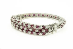 Diamond and Ruby White Gold Bangle Bracelet by Jack Gutschneider