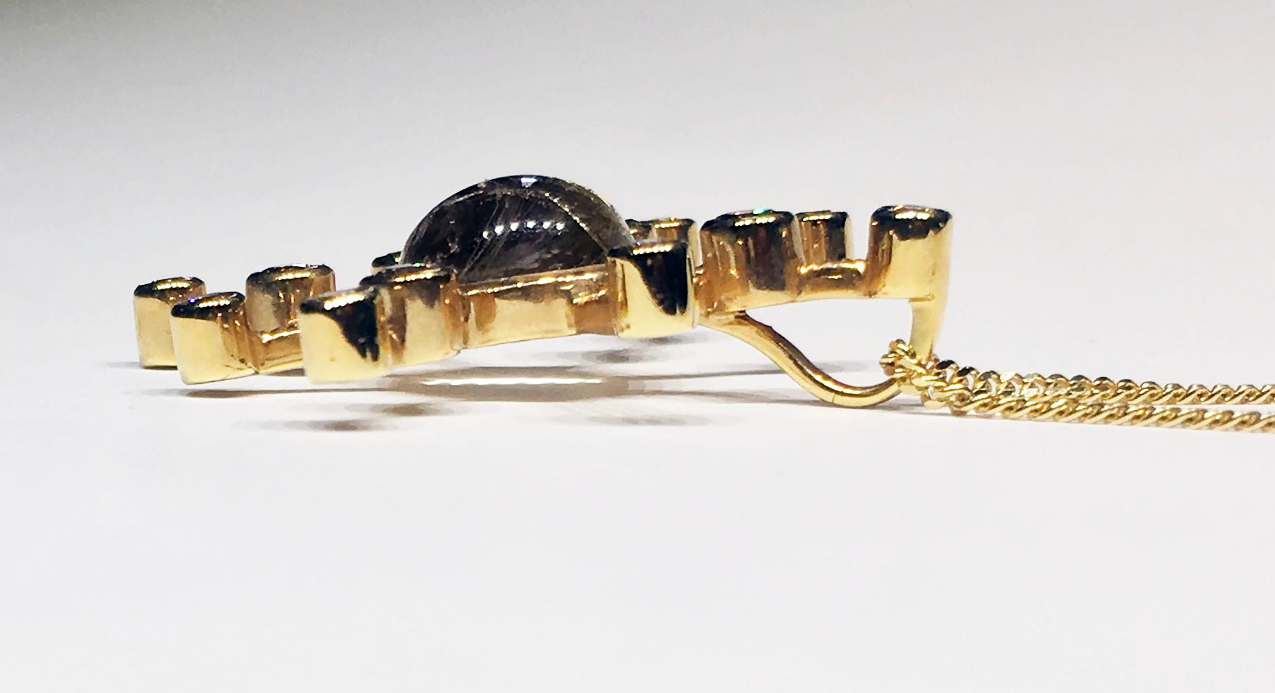 An 18k Yellow Gold Diamond Starburst Pendant set with Rutillated Quartz For Sale 3