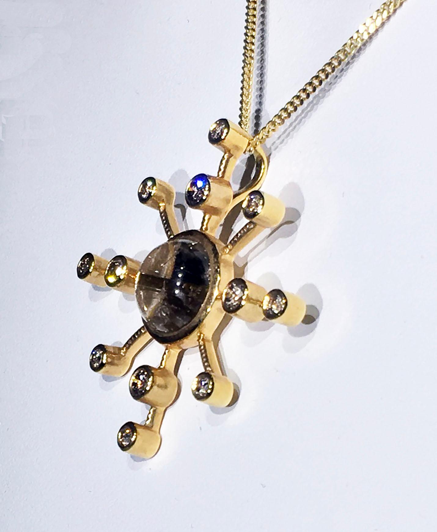 An 18k Yellow Gold Diamond Starburst Pendant set with Rutillated Quartz In New Condition For Sale In Seattle, WA