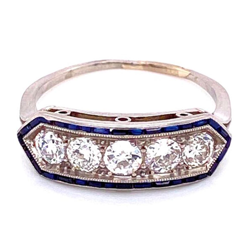 Simply Beautiful! Elegant and finely detailed Diamond and Blue Sapphire Art Deco Bar Engagement Ring set with 5 Diamonds weighing approx. 0.75 total Carat weight enhanced by Blue Sapphires, weighing approx. 0.28 total Carat weight. Hand crafted in
