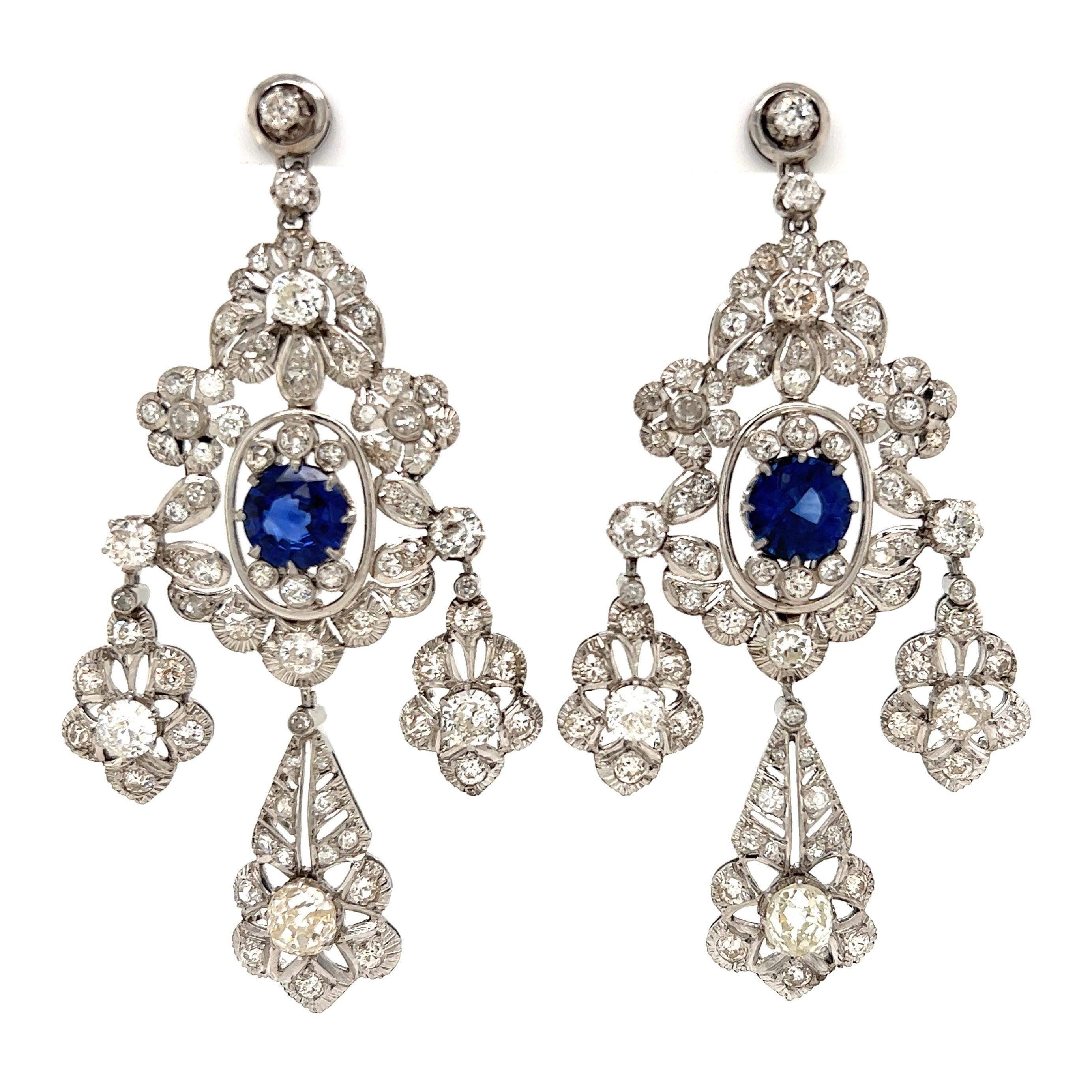 Awesome Chandelier Diamond and Sapphire Drop Earrings. Beautifully Hand crafted in Platinum. Hand set with Diamonds, approx. 8.50tcw; approx. 3.68tcw and Sapphire Gemstones approx. 3.68tcw. Earrings measure approx. 2.75” long. More Beautiful in real