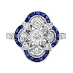 Anello floreale in stile Art Déco con diamanti e zaffiri in oro bianco 14 carati