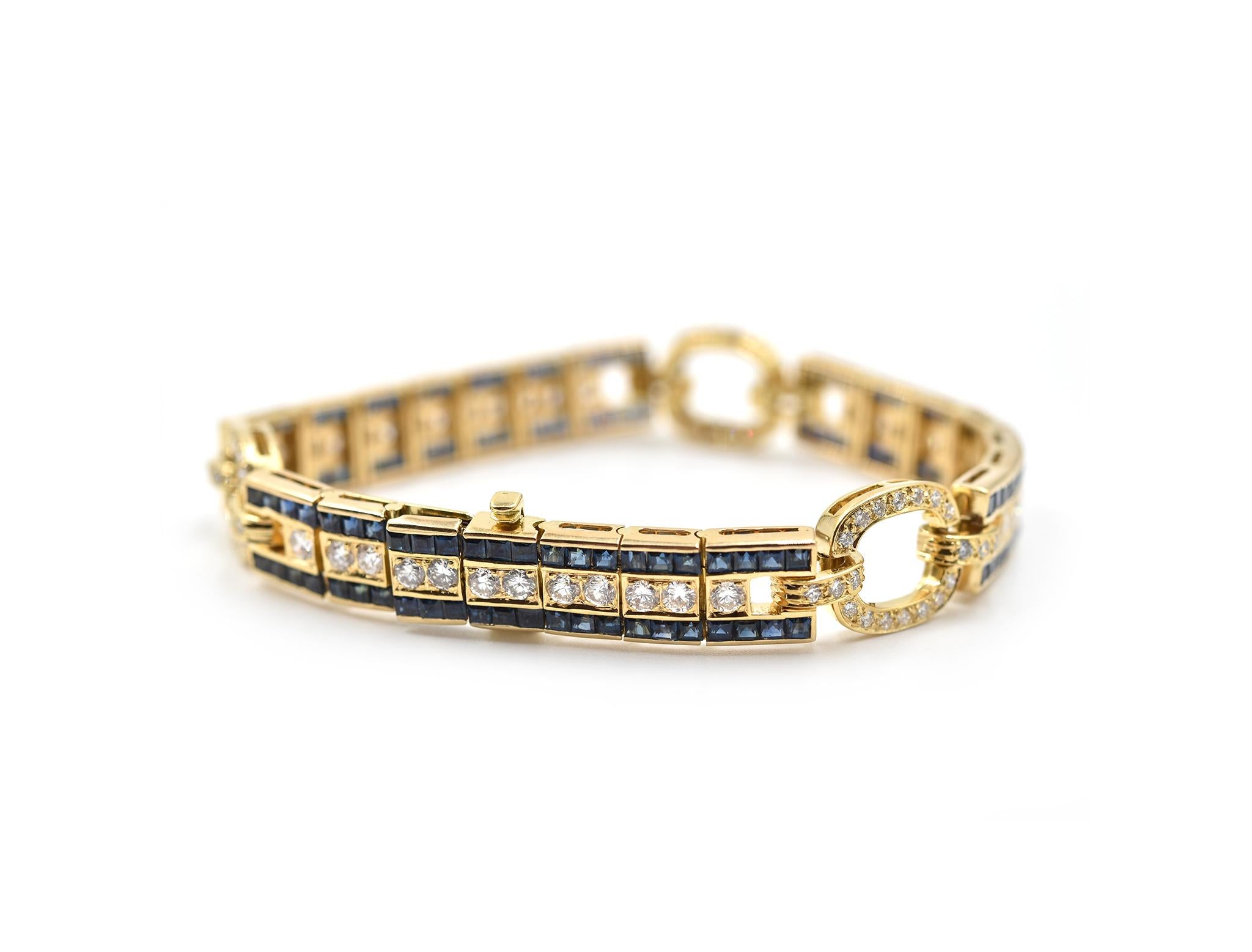 Designer: custom design
Material: 18k yellow gold
Diamonds: 93 round brilliant cut diamonds = 9.60 carat total weight
Dimensions: the bracelet is 7 1/4-inch long and 1/2-inch wide
Weight: 32.43 grams
