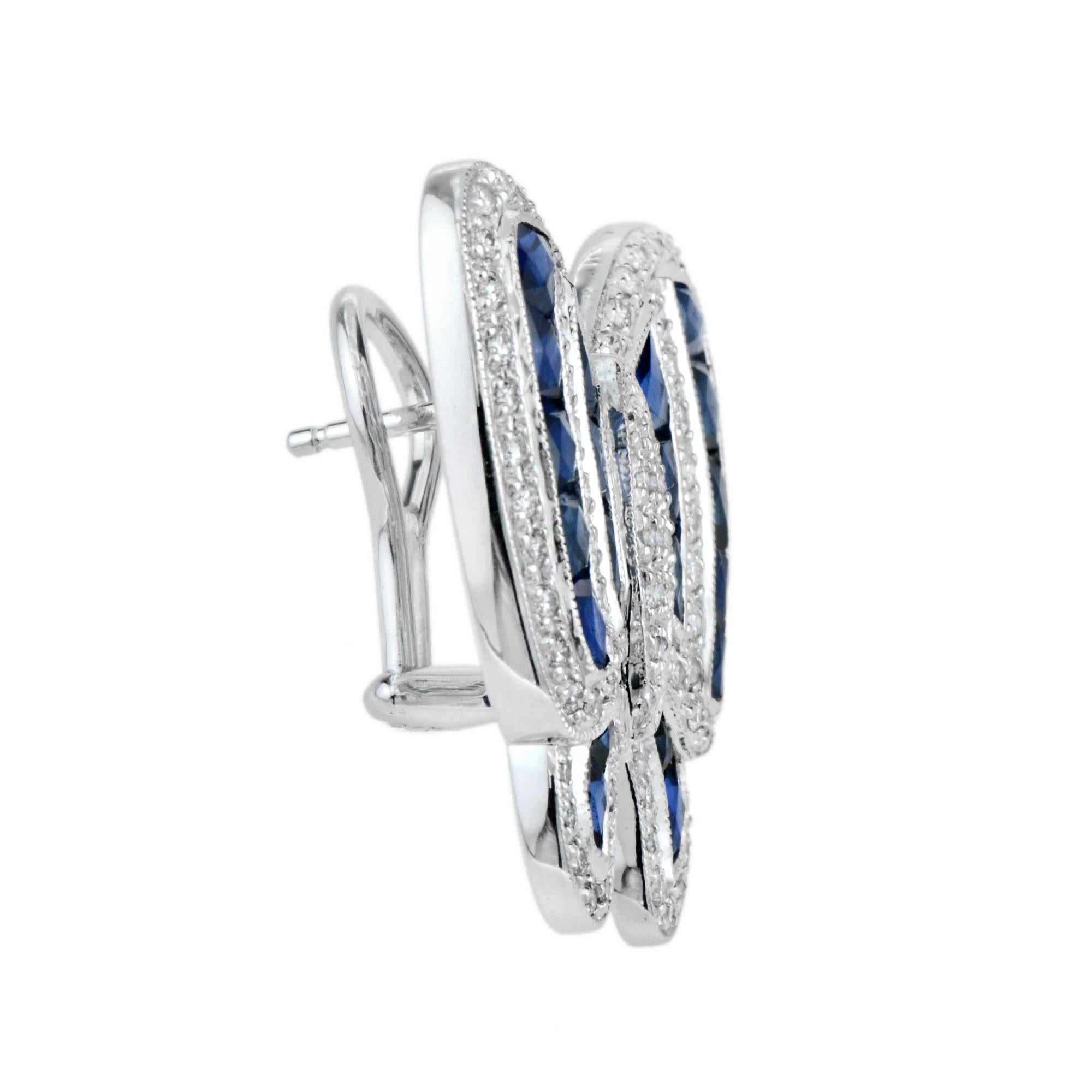 Whimsical yet elegance, these stunning earrings feature butterfly motifs. The bodies of the butterflies are round cut diamonds, and the wings are encrusted with round brilliant cut diamonds with French cut blue sapphires, capturing the unparalleled