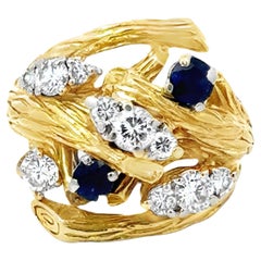 Cocktailring aus 18 Karat Gelbgold mit Diamanten und Saphiren in Cluster Branch