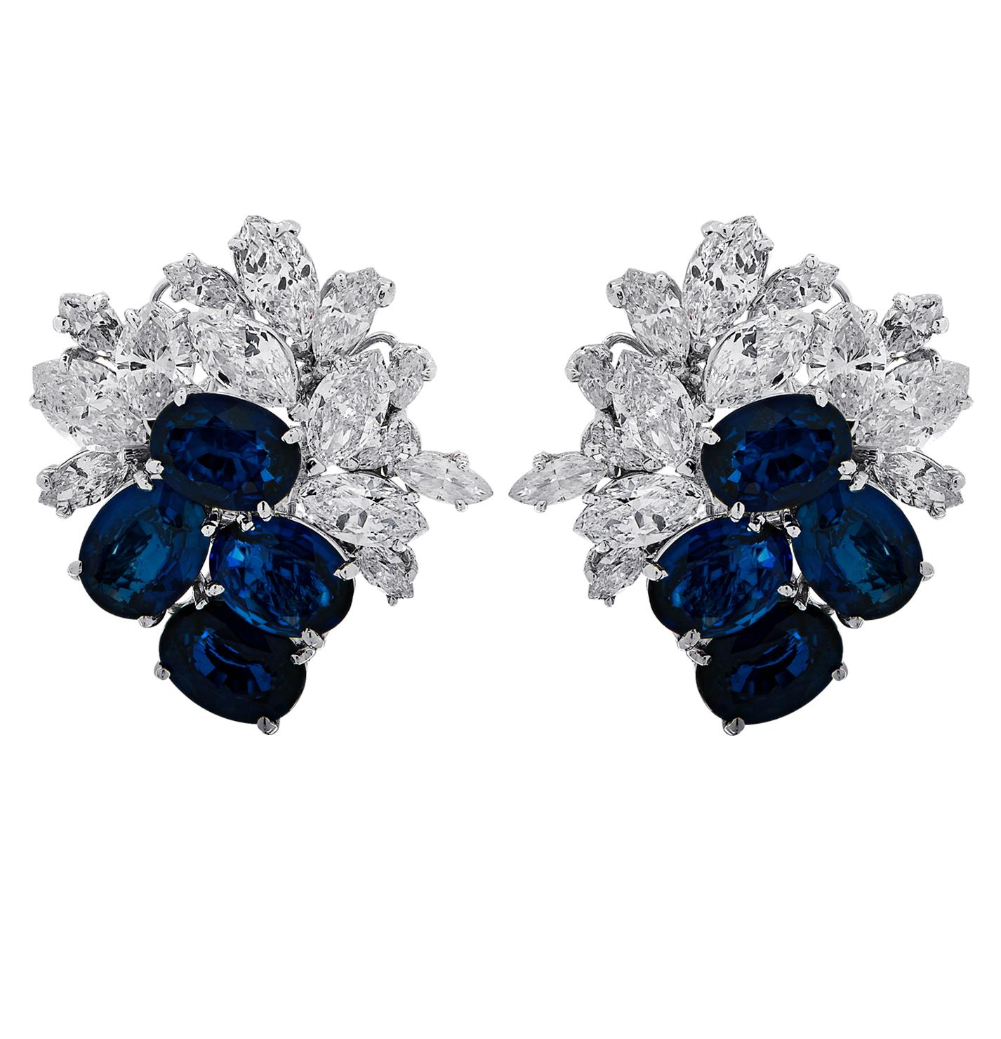 Sensational Vivid Diamonds Sapphire and Diamond cluster earrings crafted in white gold, featuring 28 marquise cut diamonds weighing approximately 8 carats total G-J color, VS-SI clarity, and 8 blue oval sapphires weighing approximately 10 carats