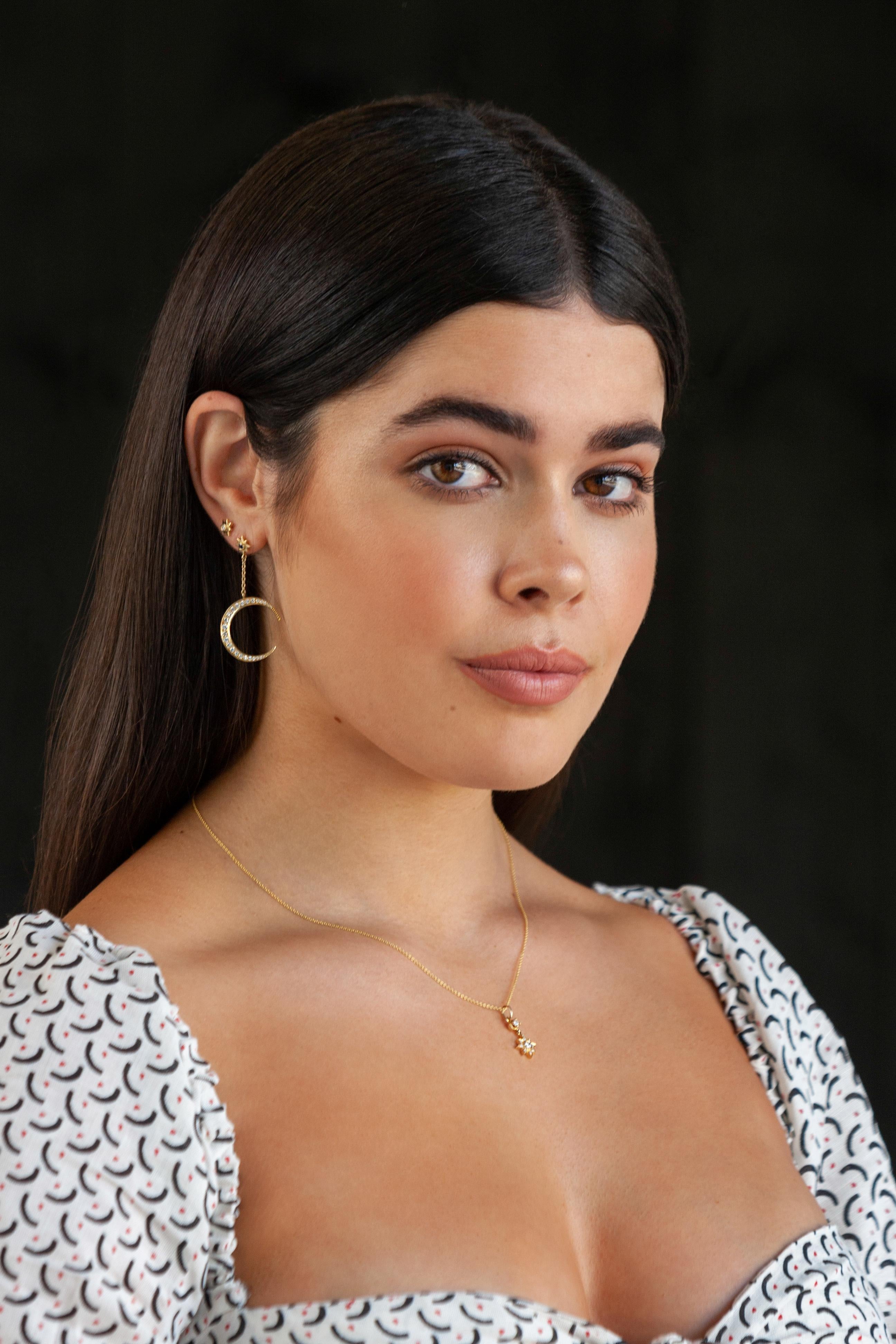 18K GOLD EARRINGS WITH DIAMONDS AND SAPPHIRES

The Crescent Moon earrings are stunningly beautiful and precious. These earrings can be styled in many different ways and are a magnificent jewel to add to your collection.

18K Gold Earrings with