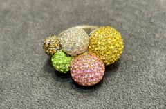Diamond and sapphire encrusted 'bubble' ring part of a set with pendant