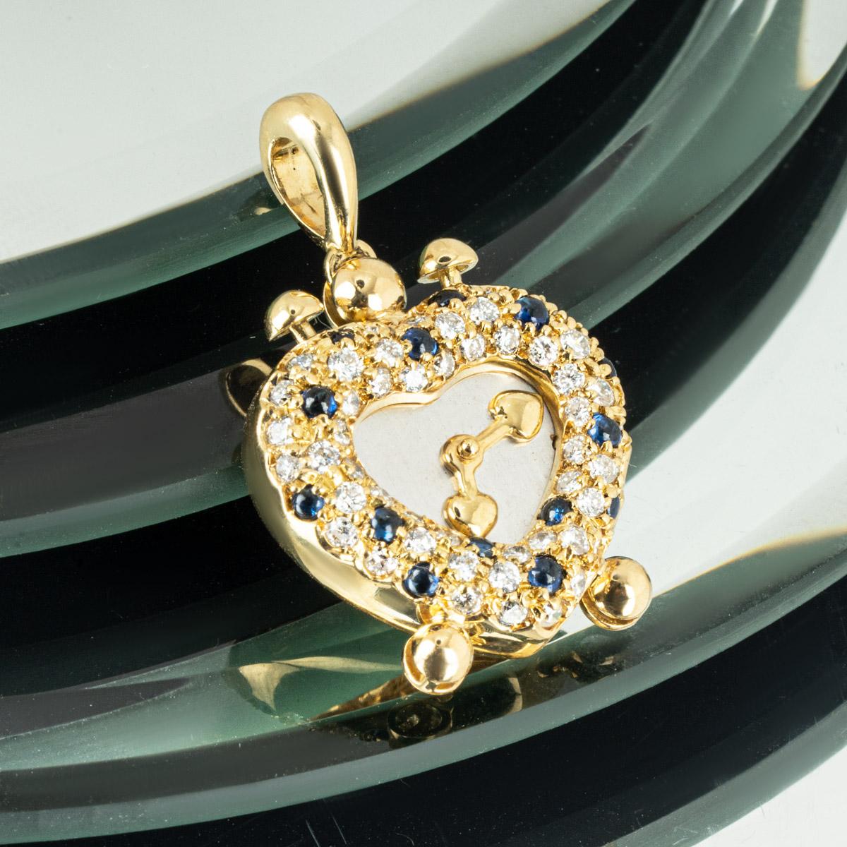 Round Cut Diamond and Sapphire Heart Clock Pendant For Sale