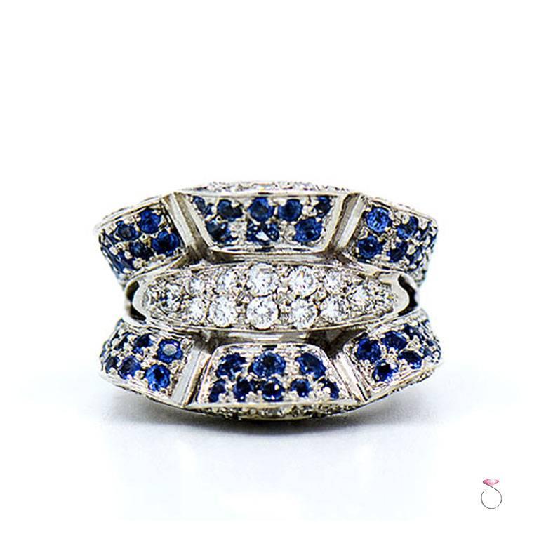 Stunning large Sapphire & diamond cocktail statement ring in 18K white gold by Assor Gioielli. This magnificently crafted ring features a total of 2.59 ct. round blue sapphires & 1.58 ct. round brilliant cu diamonds. All sapphires & diamonds are