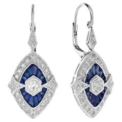 Boucles d'oreilles pendantes en or blanc 18 carats, diamants et saphirs en forme de marquise