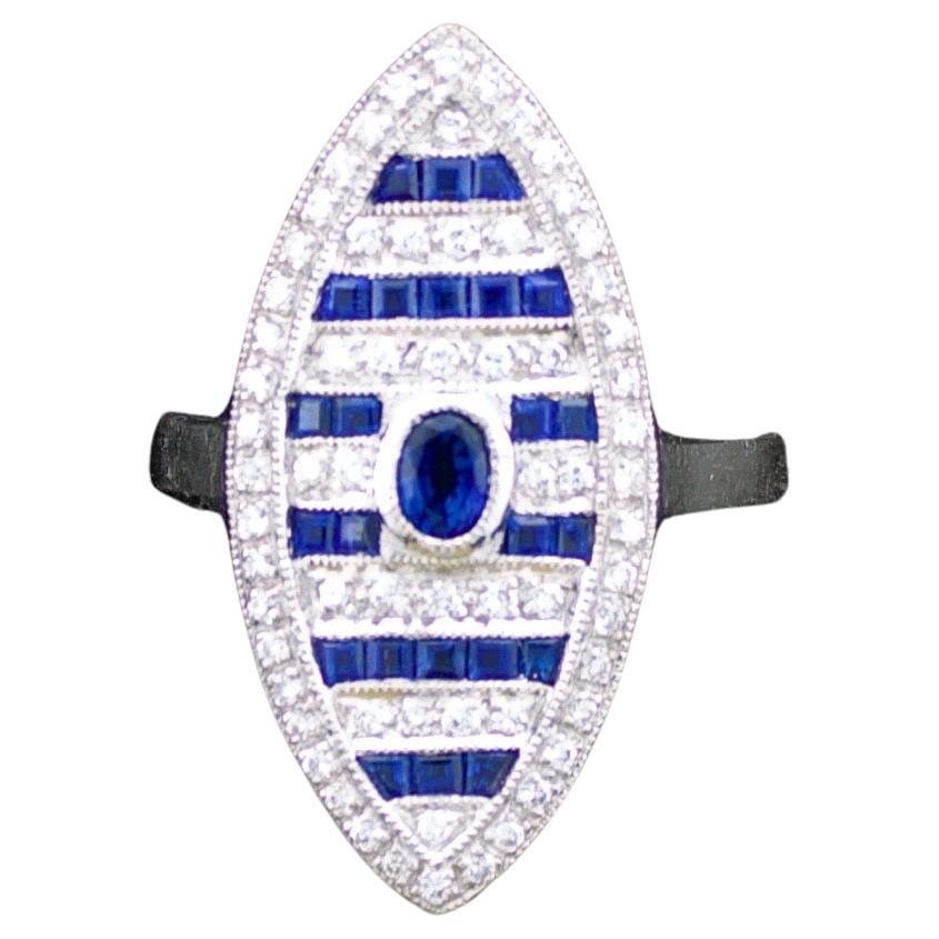 Diamond and Sapphire Marquise Shaped Ring in 18k For Sale