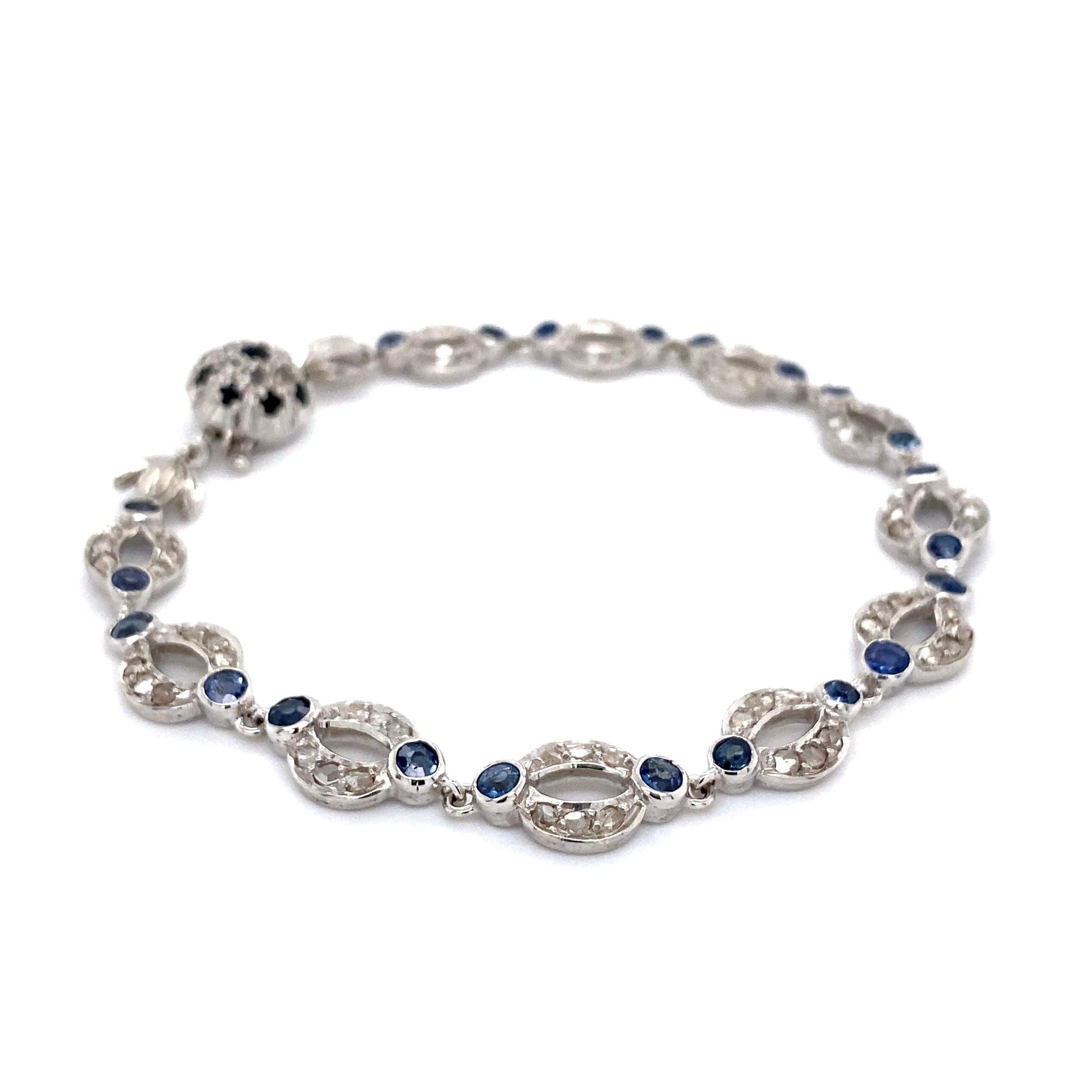 Simply Beautiful! Diamond set open Link Bracelet inter-spaced with Blue Sapphires. Hand set with 72 Rose cut Diamonds approx. 1.00tcw and 31 round Blue Sapphires approx. 3.25tcw. Bracelet measures approx. 7.75”long. Hand set and Hand crafted in