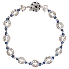 Bracciale aperto in platino con diamanti e zaffiri Estate Jewelry