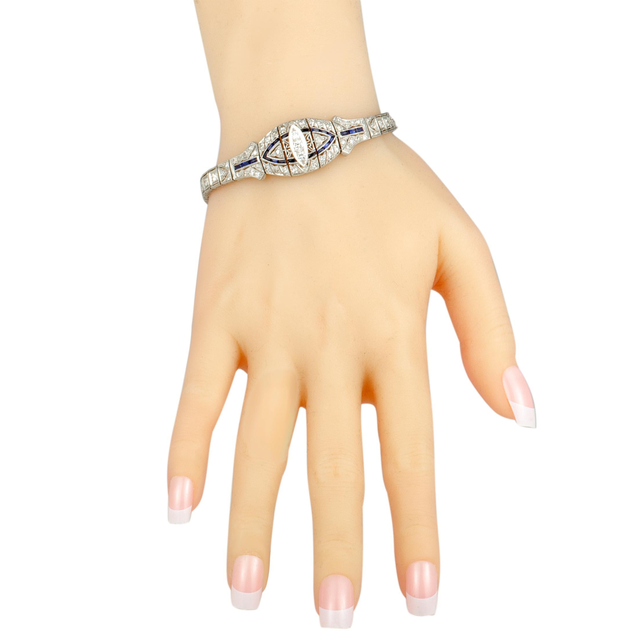 With its enticingly intricate Art Deco design, this fascinating bracelet is a piece of astounding aesthetic and artistic value that will accentuate any ensemble of yours in a splendidly classy fashion. The bracelet is made of platinum and lavishly