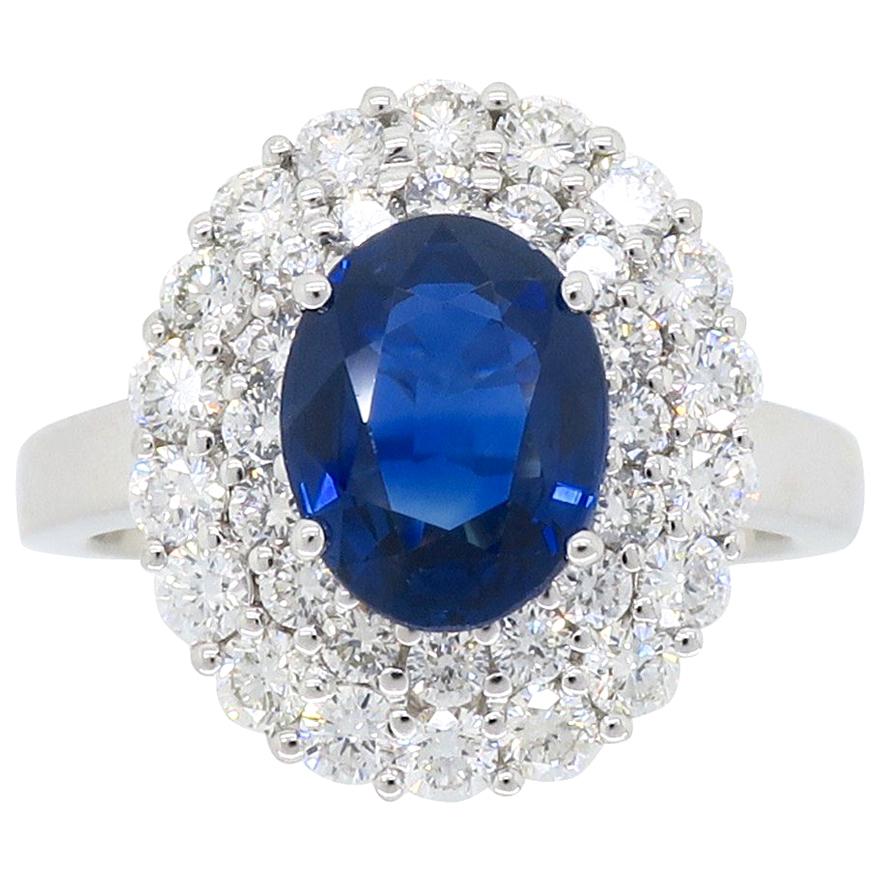 Diamond and Sapphire Princess Diana Style Ring in 18 Karat White Gold