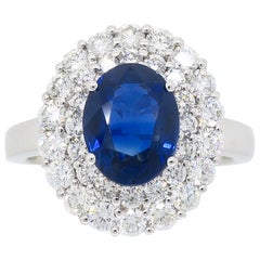 Diamond and Sapphire Princess Diana Style Ring in 18 Karat White Gold