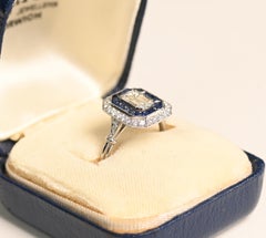 Double Halo Engagement Ring. GIA 0.80ct Emerald Cut Diamond Sapphire Platinum
