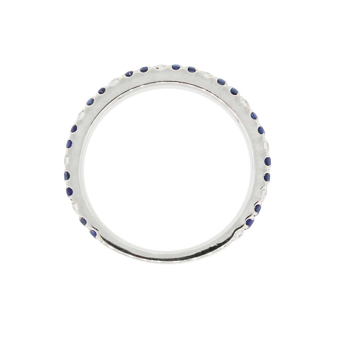 Material: 14k white gold
Diamonds Details: Approximately 0.10ctw of round brilliant diamonds. Diamonds are G/H in color and VS in clarity.
Gemstone Details: Approximately 0.20ctw of round shape sapphires
Ring Measurements: 0.77″ x 0.07″ x
