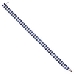 Diamond and sapphire three row line bracelet in platinum Diamond and sapphire three row line bracelet in platinum