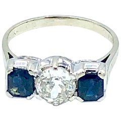 Diamond and Blue Sapphire Three-Stone Engagement Ring