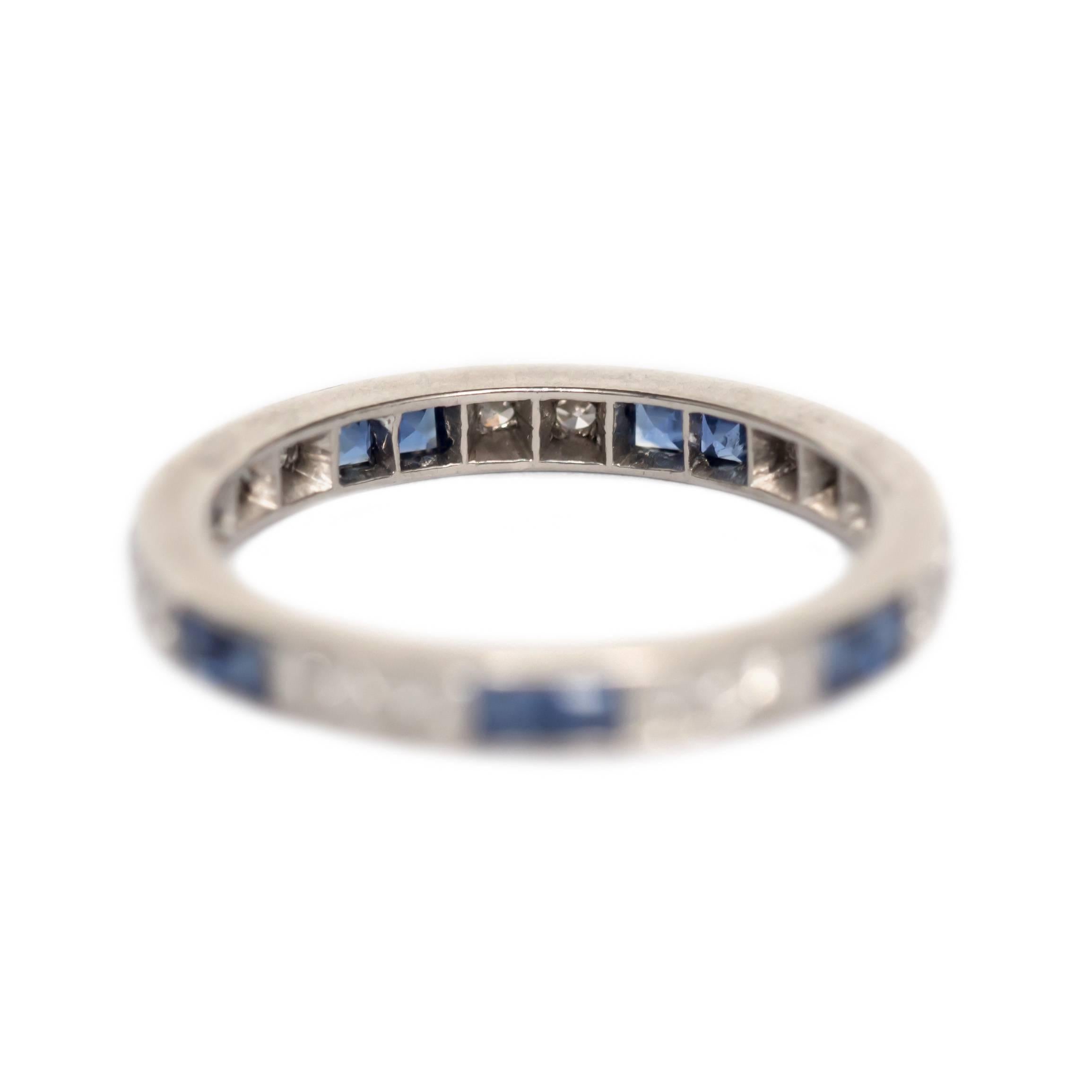 Item Details: 
Ring Size: 6
Metal Type: 18 Karat White Gold 
Weight: 2.4 grams

Side Stone Details: 
Shape: Old European
Total Carat Weight: .15 carat, total weight
Color:F
Clarity: VS

Color Stone Details: 
Type: Sapphire
Shape: Princess Cut 
Carat